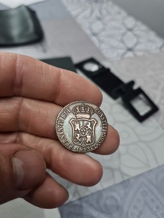 Moneda 3 quartos