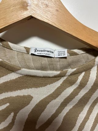 Top beige talla XS de Stradivarius