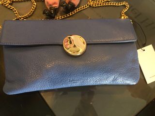 Bolso cartera PdH, Nuevo