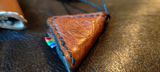 portachiavi e o collane porta plettri chitarra