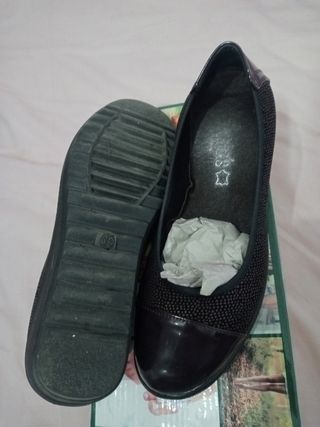 Zapato con punta charol