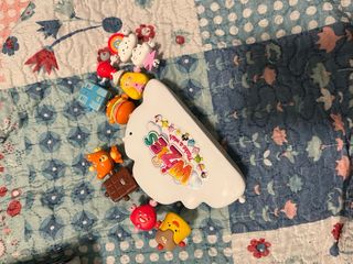 10 muñecos wizies + juguete de nuve