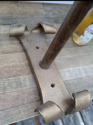 Lampada a torcia antica in ghisa forgiata