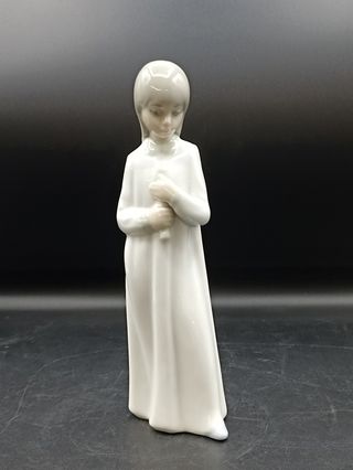 Figura niña porcelana española