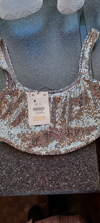 Top de fiesta y brillos