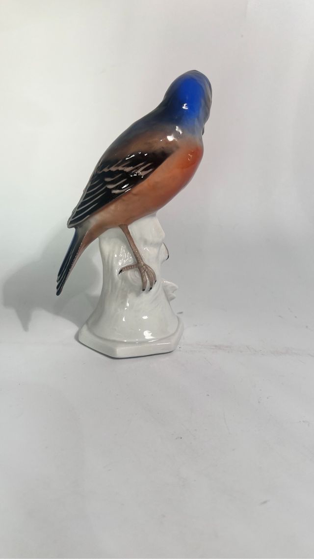 Statuetta in ceramica con uccellino blu arancione