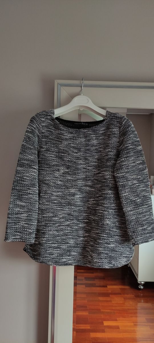 Jersey negro. Suéter. Punto. Manga larga.