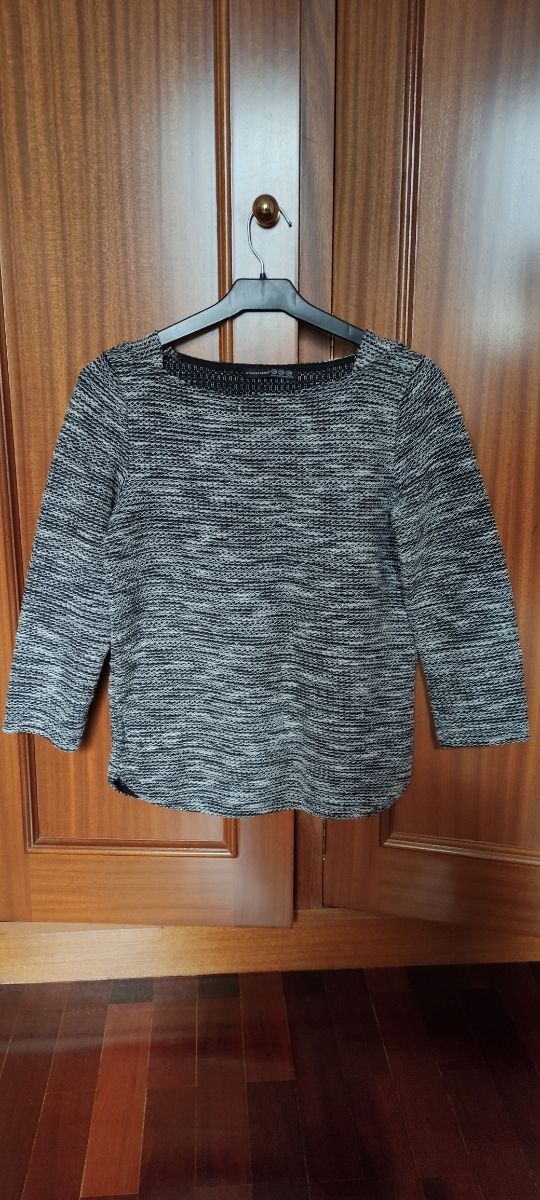 Jersey negro. Suéter. Punto. Manga larga.