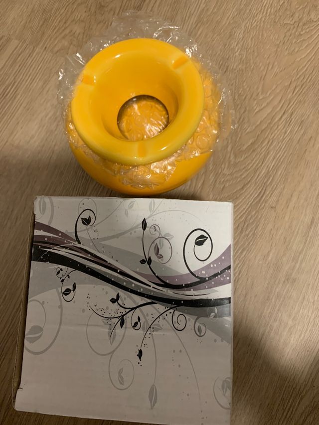 Regala cenicero Amarillo