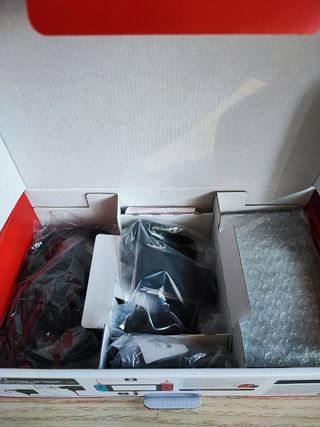 Nintendo Switch + funda y accesorios