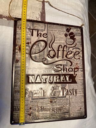 targa in metallo e quadretti vintage