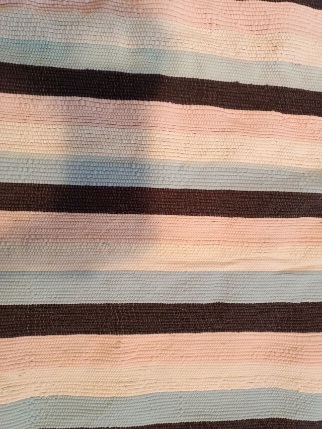 Tela alfombra a mano