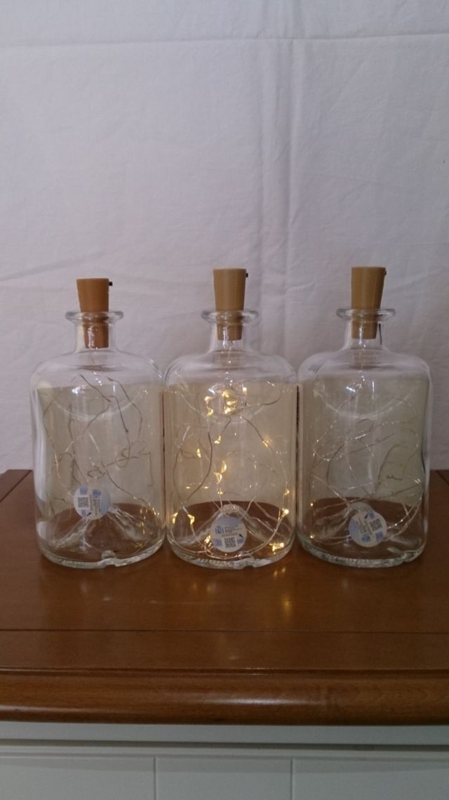 Bottiglie Otyum con luci