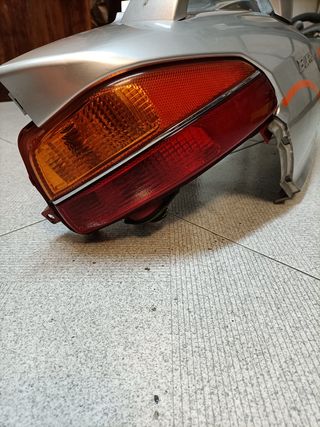 Tapa lateral Suzuki burgman 650