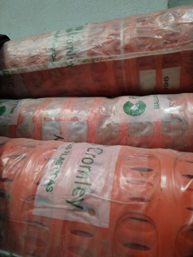 Mayas naranja de obra rollos nuevos