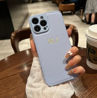 Funda personalizada iPhone cuero grabada