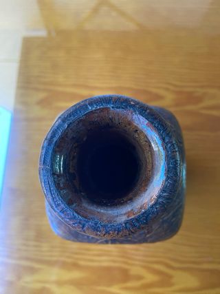 Botella de cristal forrada en cuero