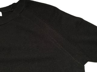 Mini vestido de punto negro. Ver medidas