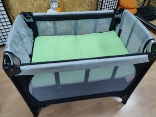 Cuna de viaje convertible