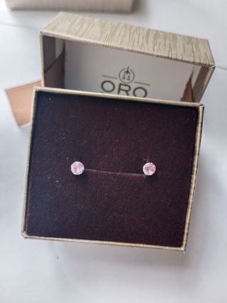 Pendiente en oro 18 k agua marina rosa central.