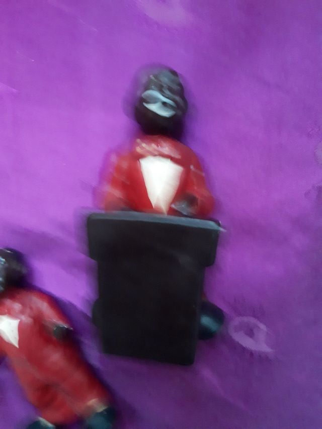 Banda musicos negros escayola