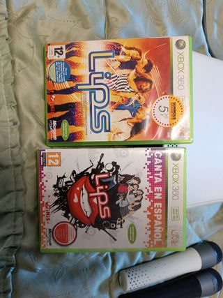 Xbox 360 + mando + dos microfonos + pack de juegos