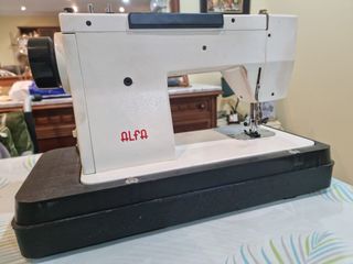 Máquina de coser alfa