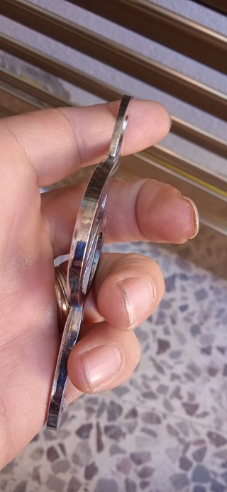 Apribottiglie forma chiave violino