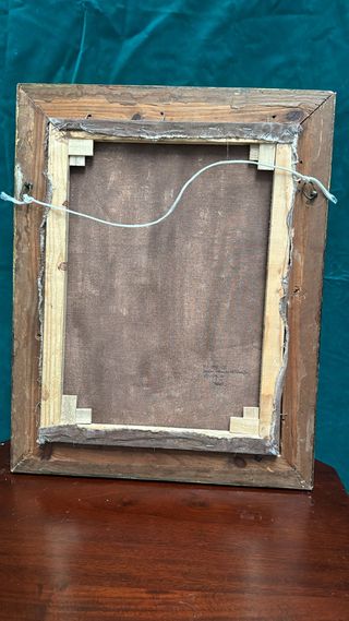 Divina pastora con niño, pintada sobre óleo.