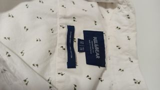 Camisa blanca detalles palmeras