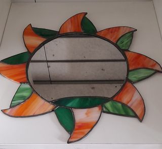 Specchio tipo tiffany a forma di sole