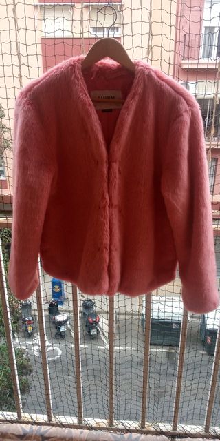 Abrigo de pelo rosa. 