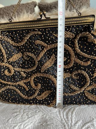 Bolso negro y dorado Fiesta