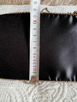 Bolso negro y dorado Fiesta