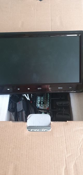 DVD y cascos para reposacabezas coche