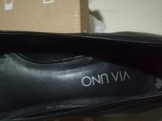 Zapato de vestir. 