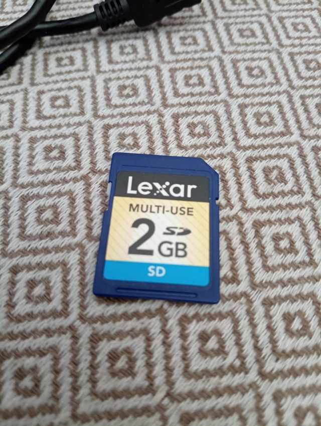 nikon D3000 con dos objetivos y complementos