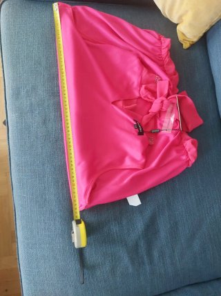 Blusa elegante fucsia de sisa sin mangas