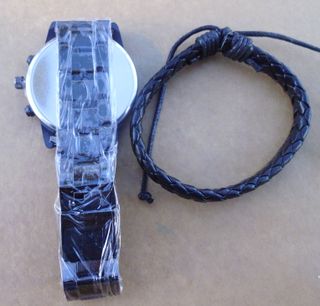 conjunto reloj pulsera metálica y pulsera de cuero