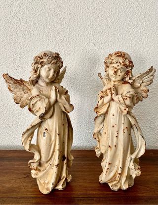 pareja de hadas en hierro fundido