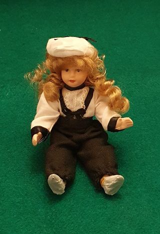 Muñeca cerámica articulada de colección