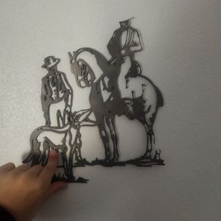 Figura de forja para pared
