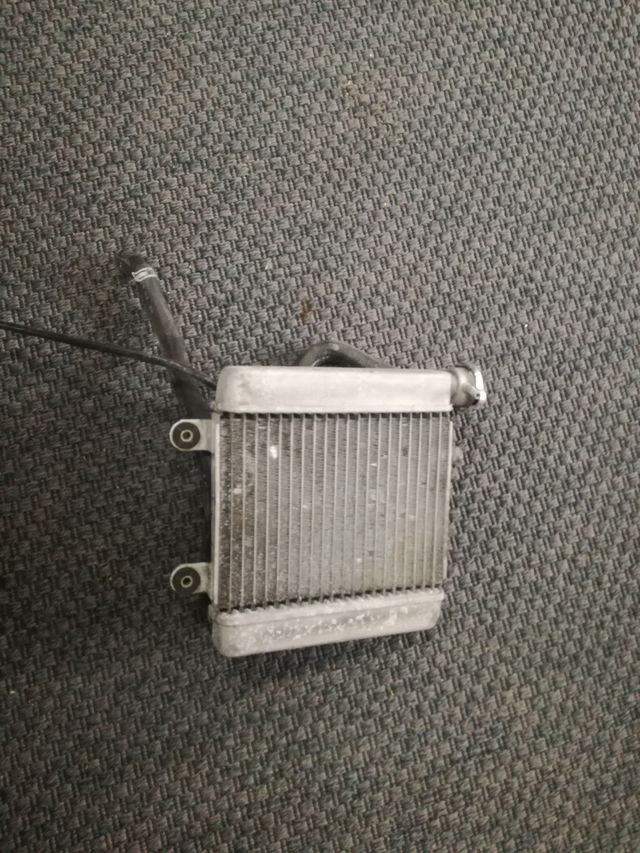 Radiador y ventilador HONDA PANTHEON 125