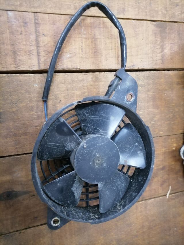 Radiador y ventilador HONDA PANTHEON 125