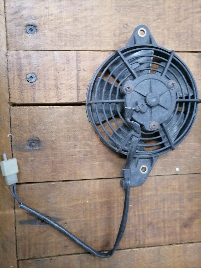 Radiador y ventilador HONDA PANTHEON 125