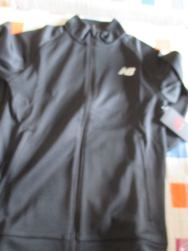 Chaqueta New Balance tenacity knit Talla S