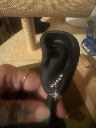 pendientes alargados con estrella colgante