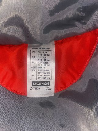 Chaqueta quechua naranja niño