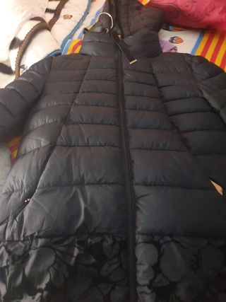 Plumifero mujer