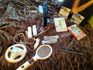 oferta a Consola wii con accesorios y juegos 100€